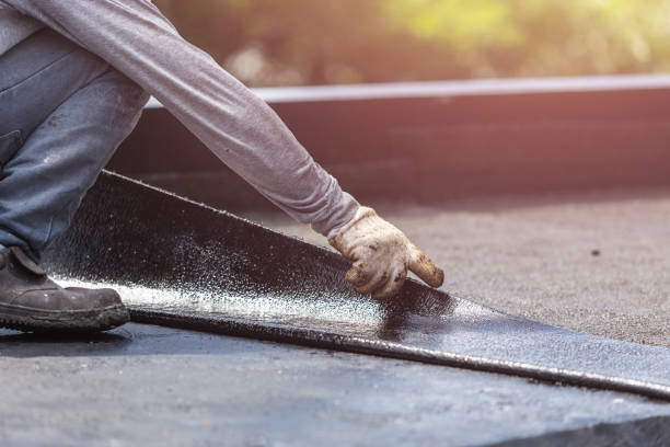 Professional Emergency Waterproofing technician working in Marquette, MI